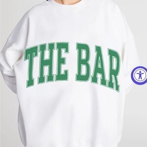 NWT Sold Out White Varsity Sweatshirt with Green 'THE BAR' letters